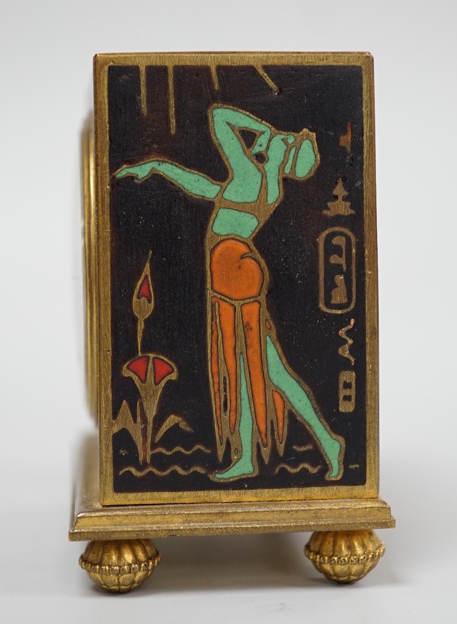A Zenith champleve enamel Egyptianesque travelling alarm clock in case, 10cm total height
